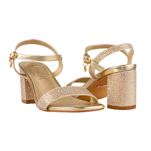 Gold high-heeled sandals with rhinestone embellishments on a white background