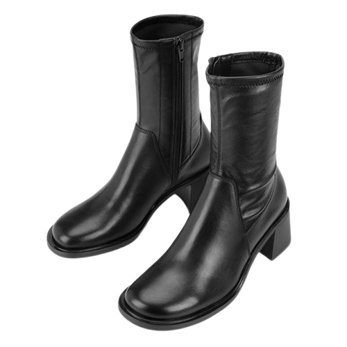 Pair of black leather boots on a white background
