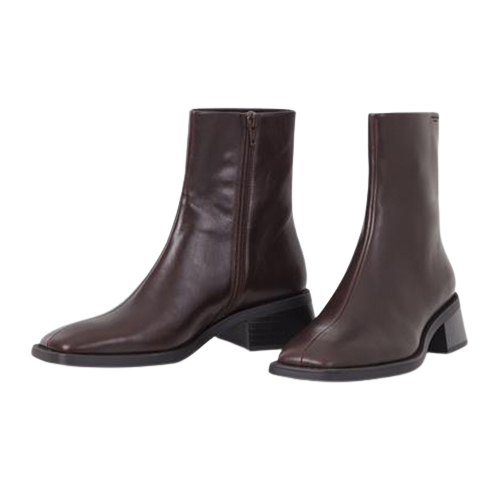Pair of brown leather ankle boots on a white background