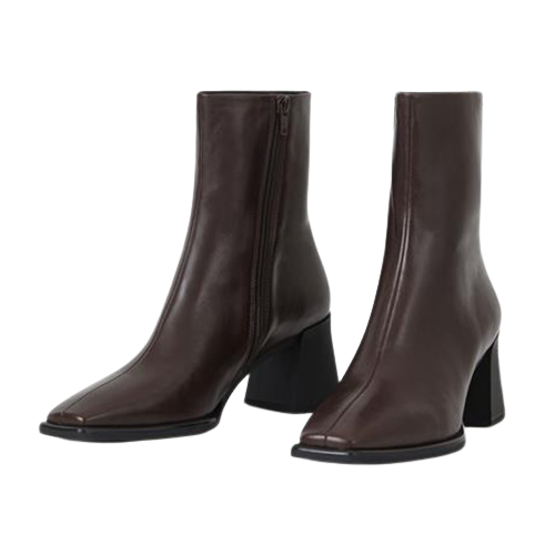 Pair of brown leather ankle boots on a white background