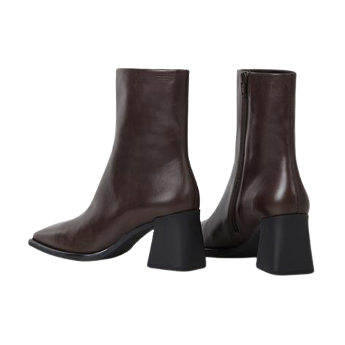 Pair of brown ankle boots with black block heels on a white background