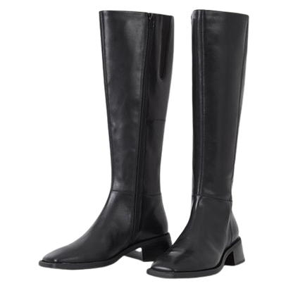 Pair of black knee-high boots on a white background