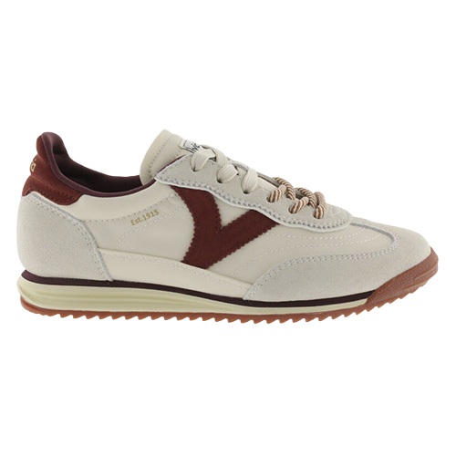 A low-top trainers in off-white leather with a prominent dark burgundy V-shaped side stripe, matching burgundy heel tab, and a brown textured rubber sole.