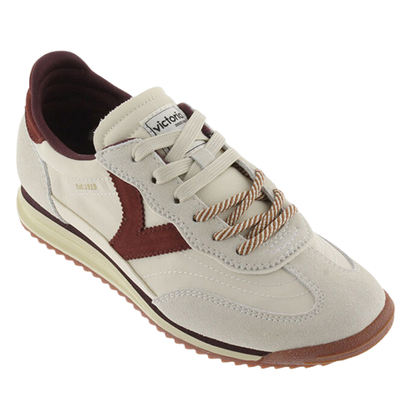 A vintage-style low-top trainers  by Victorinox, featuring off-white suede and leather panels, a dark burgundy V-shaped side accent, and twisted beige rope laces, shown on a plain white background.