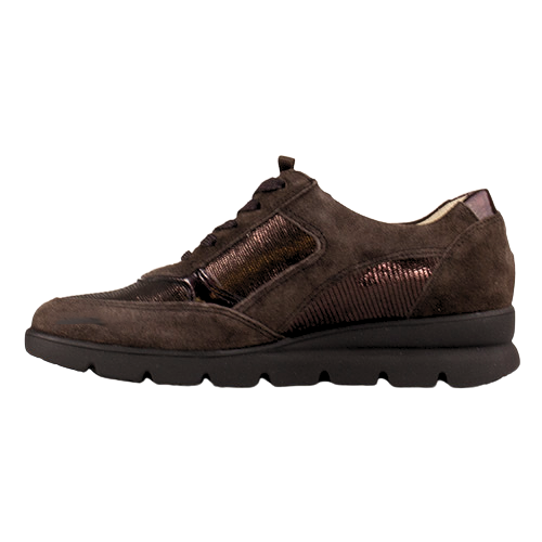 A dark brown textured trainer with a mix of suede, mesh, and metallic patterned panels, featuring a side zipper, laces, and a chunky black sole.