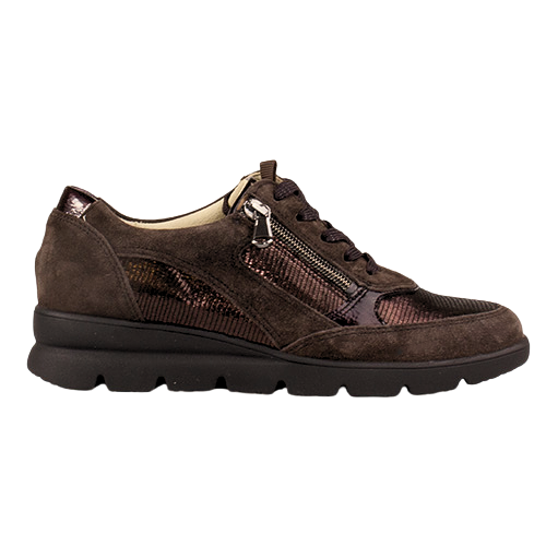 A dark brown textured trainer with a mix of suede, mesh, and metallic patterned panels, featuring a side zipper, laces, and a chunky black sole.