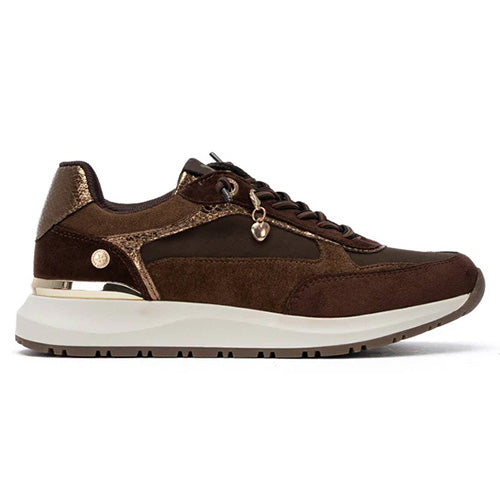 Brown trainer  with white sole on a white background