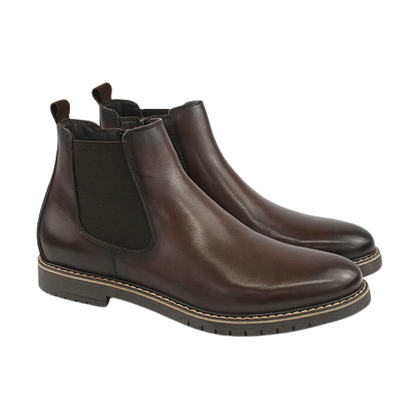 A pair of dark brown leather Chelsea boots with black elastic side panels, shown on a plain  background.