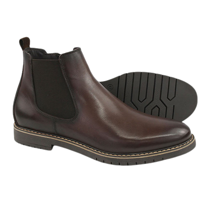 A pair of dark brown leather Chelsea boots, with one boot standing upright to show the side profile and elastic side panel, and the other lying flat to display the treaded outsole.